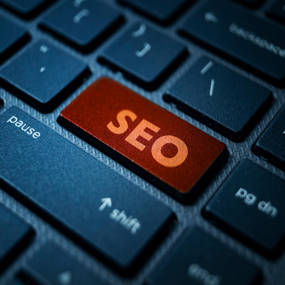 Keyboard with highlighted SEO key representing search engine optimization